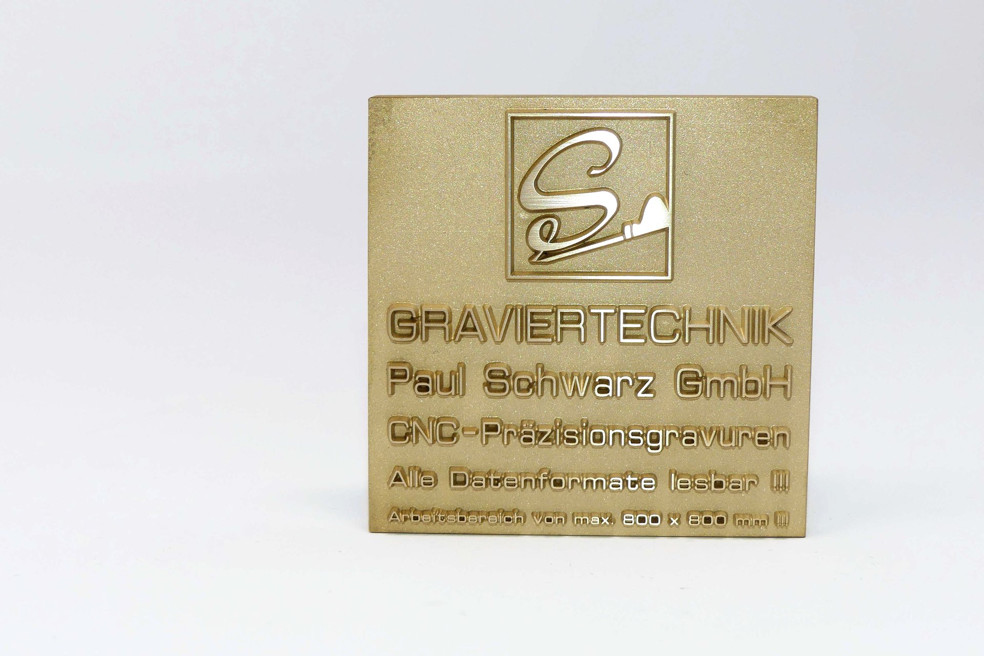 Messingprägestempel mit erhaben gravierter Logofläche
